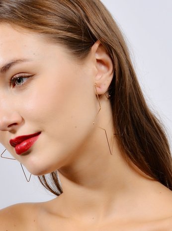 Trendy Oversized Ster Oorbellen in Goud